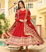 Red faux georgette zari sequins embroidered flared gown with heavy dupatta