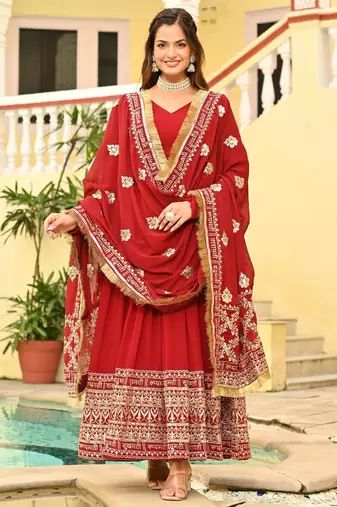 Red faux georgette zari sequins embroidered flared gown with heavy dupatta