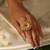 Gold plated red stone temple ring