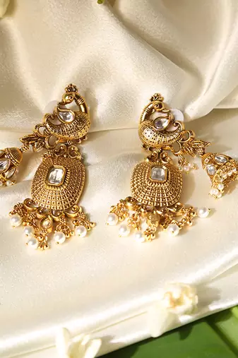 Gold plated temple pearl dangler earrings