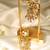 Gold plated temple pearl dangler earrings