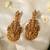 Gold plated red stone temple earrings