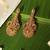 Gold plated red stone temple earrings