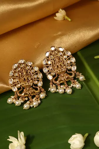Gold plated temple pearl earrings