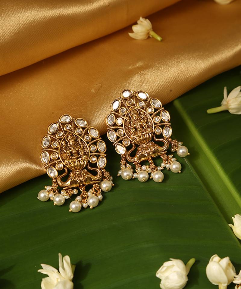 Gold plated temple pearl earrings