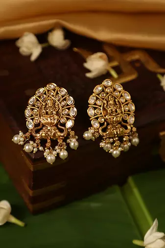 Gold plated temple pearl earrings