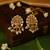 Gold plated temple pearl earrings