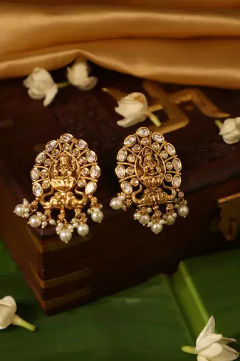 Gold plated temple pearl earrings