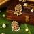 Gold plated temple pearl earrings