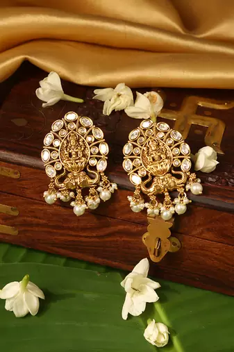 Gold plated temple pearl earrings