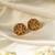 Gold plated temple stud earrings
