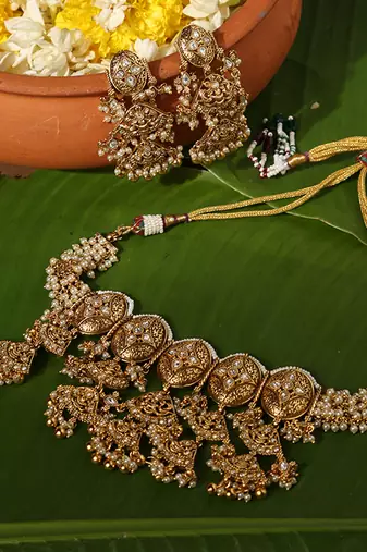 Gold plated pearl temple necklace set