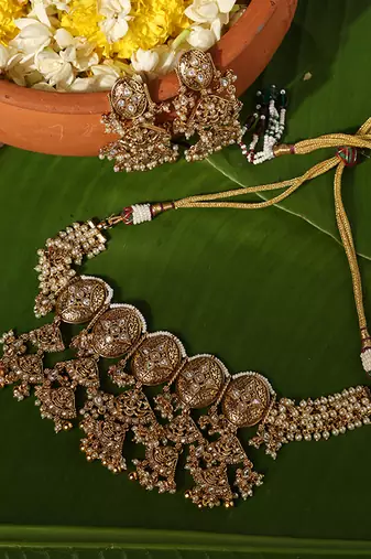 Gold plated pearl temple necklace set
