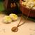 Gold plated temple pendant necklace set