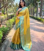 Yellow Woven designer tissue silk saree with blouse piece