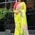new fendy silk yellow hand work saree with contrast blouse