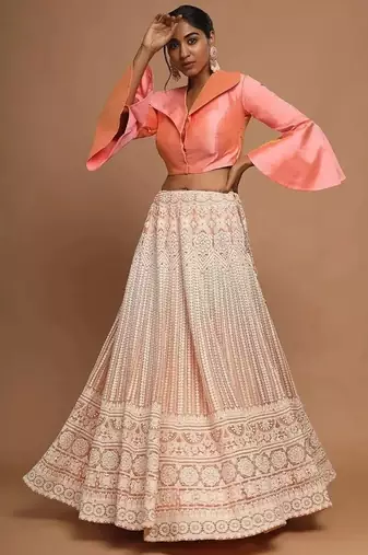 Lavishing Peach Net Lakhnavi Work Party Wear Crop Top Lehenga