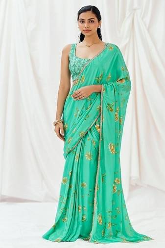 Turquoise floral printed crepe saree