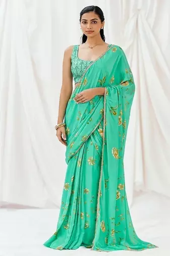 Turquoise floral printed crepe saree