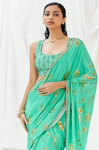 Turquoise floral printed crepe saree
