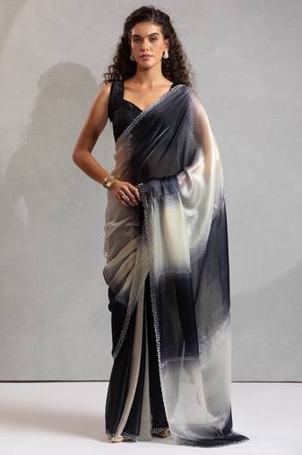 Black color zharkhan beads with stone work fendy silk two tone saree with running blouse