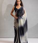 Black color zharkhan beads with stone work fendy silk two tone saree with running blouse