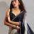 Black color zharkhan beads with stone work fendy silk two tone saree with running blouse
