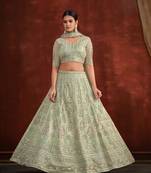 Pista Green Net Silk Party Wear Lehenga with Heavy Embroidery Blouse