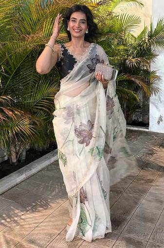 new white Silk Blended saree with lotus print 