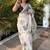 new white Silk Blended saree with lotus print 