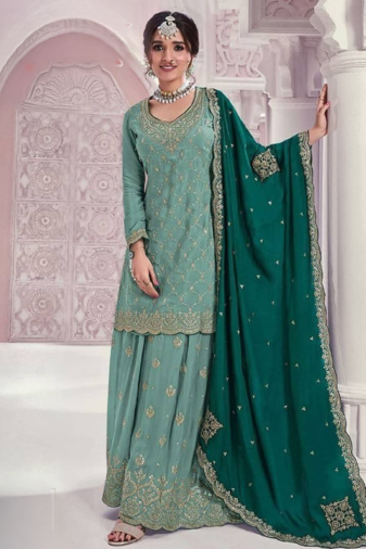 Elegant pastel green embroidered palazzo suit with heavy dupatta