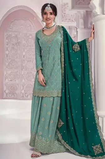 Elegant pastel green embroidered palazzo suit with heavy dupatta