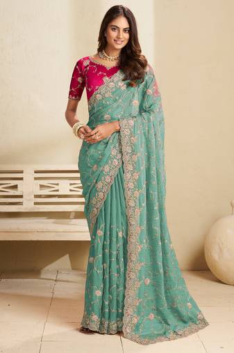Sea green embroidery and glitter cords fendi fabric saree with embroidered silk blouse fabric
