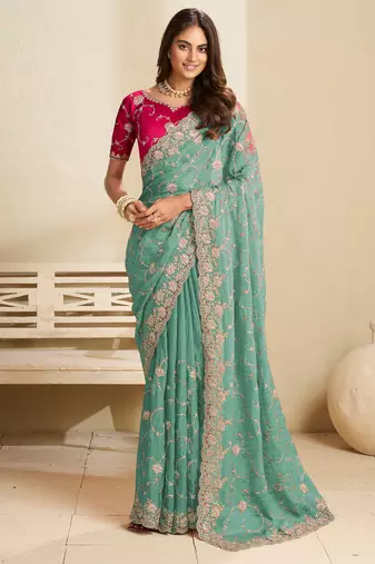 Sea green embroidery and glitter cords fendi fabric saree with embroidered silk blouse fabric