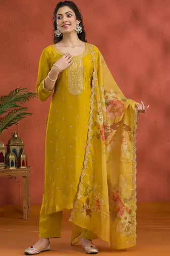 new yellow vichitra silk based long suit for women summer wear