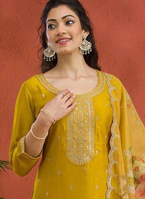 new yellow vichitra silk based long suit for women summer wear 2