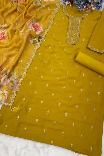 new yellow vichitra silk based long suit for women summer wear