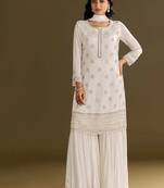 new georgette white palazzo suit with hand work finish