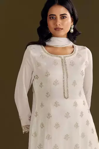 new georgette white palazzo suit with hand work finish