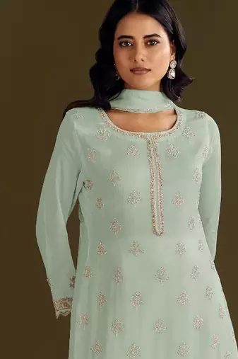 new georgette pista green palazzo suit with hand work finish