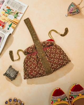 red silk floral embroidered potli bag with beaded handle 1