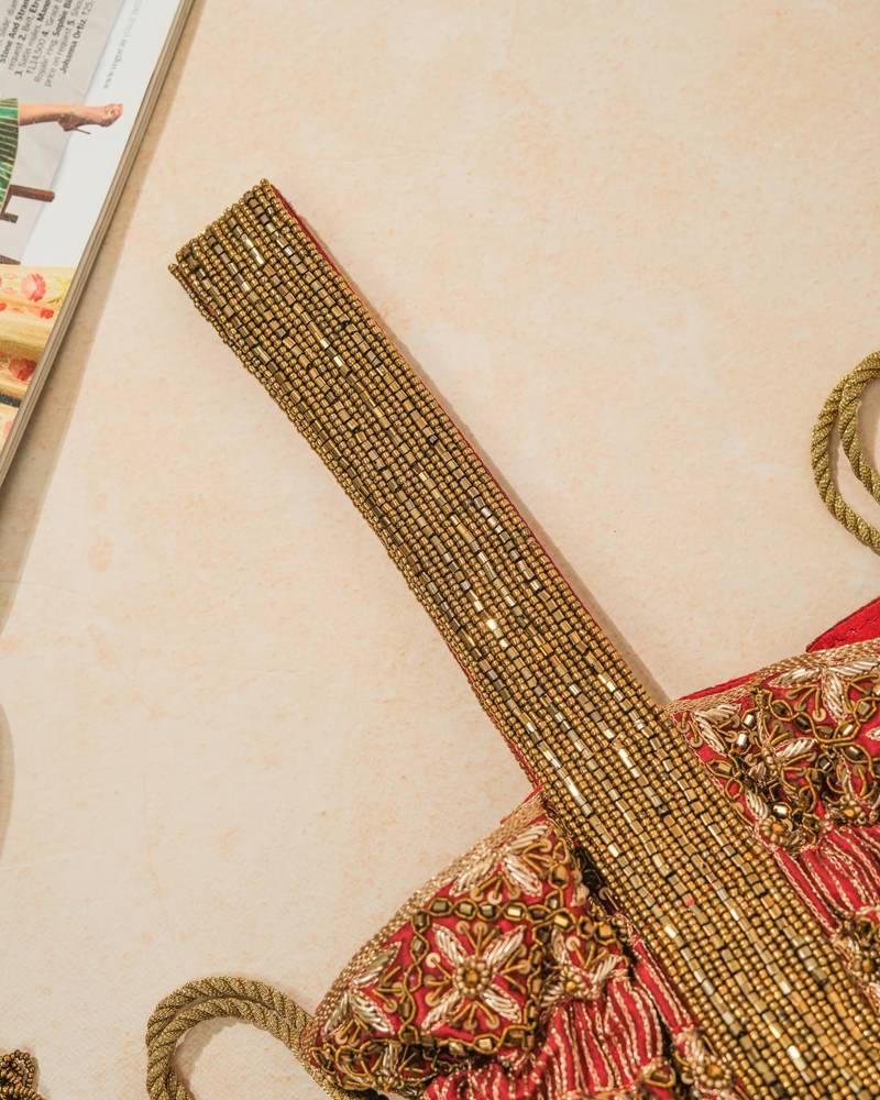 Red silk embroidered potli bag