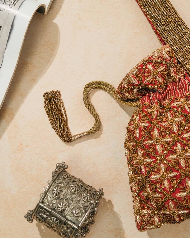 Red silk embroidered potli bag