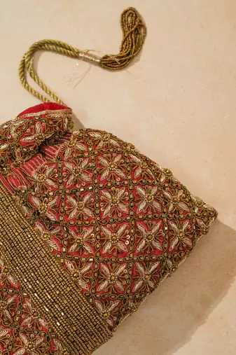 red silk floral embroidered potli bag with beaded handle