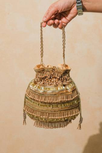 Gold silk embroidered potli bag