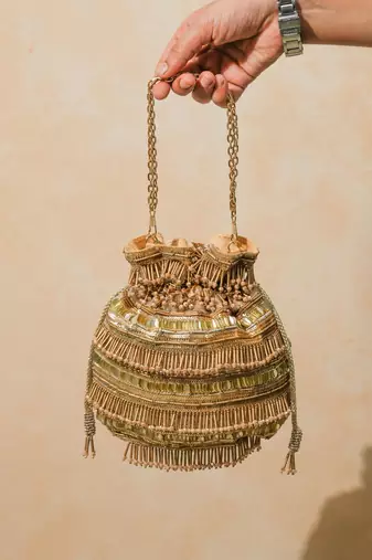Gold silk embroidered potli bag