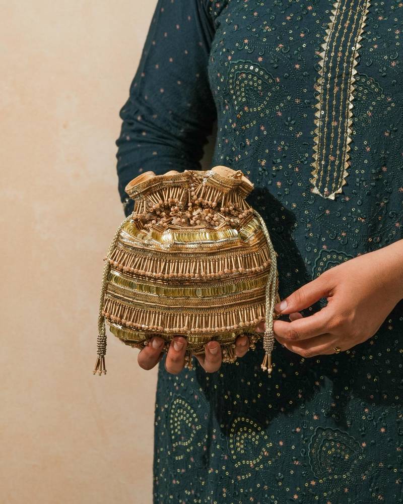 Gold silk embroidered potli bag