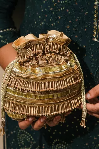 gold silk embroidered ethnic potli bag