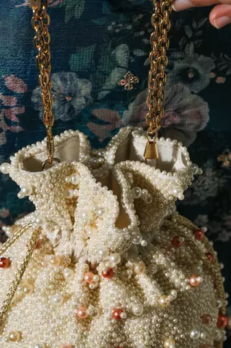 white pearl embroidered silk potli bag for festive wear