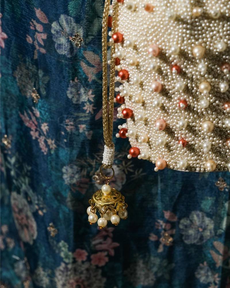 Pearl embroidered silk potli bag